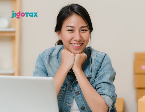 J-1 visa holder reviewing tax forms 1040-NR and W-2 income documentation