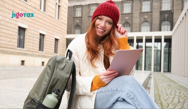 J-1 visa holder from India filing taxes in Indiana with W-2 income documentation and calculator